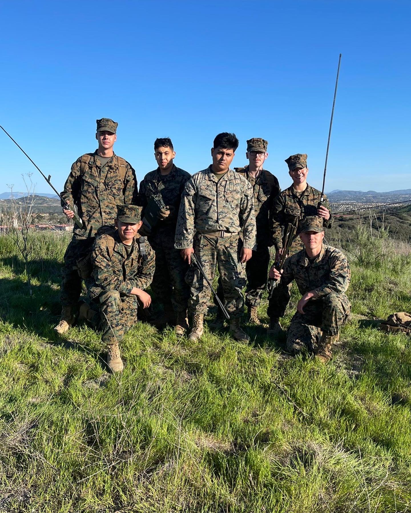 Thomas (right) with fellow Marines